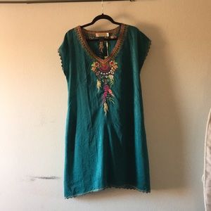 Turquoise dress with pockets